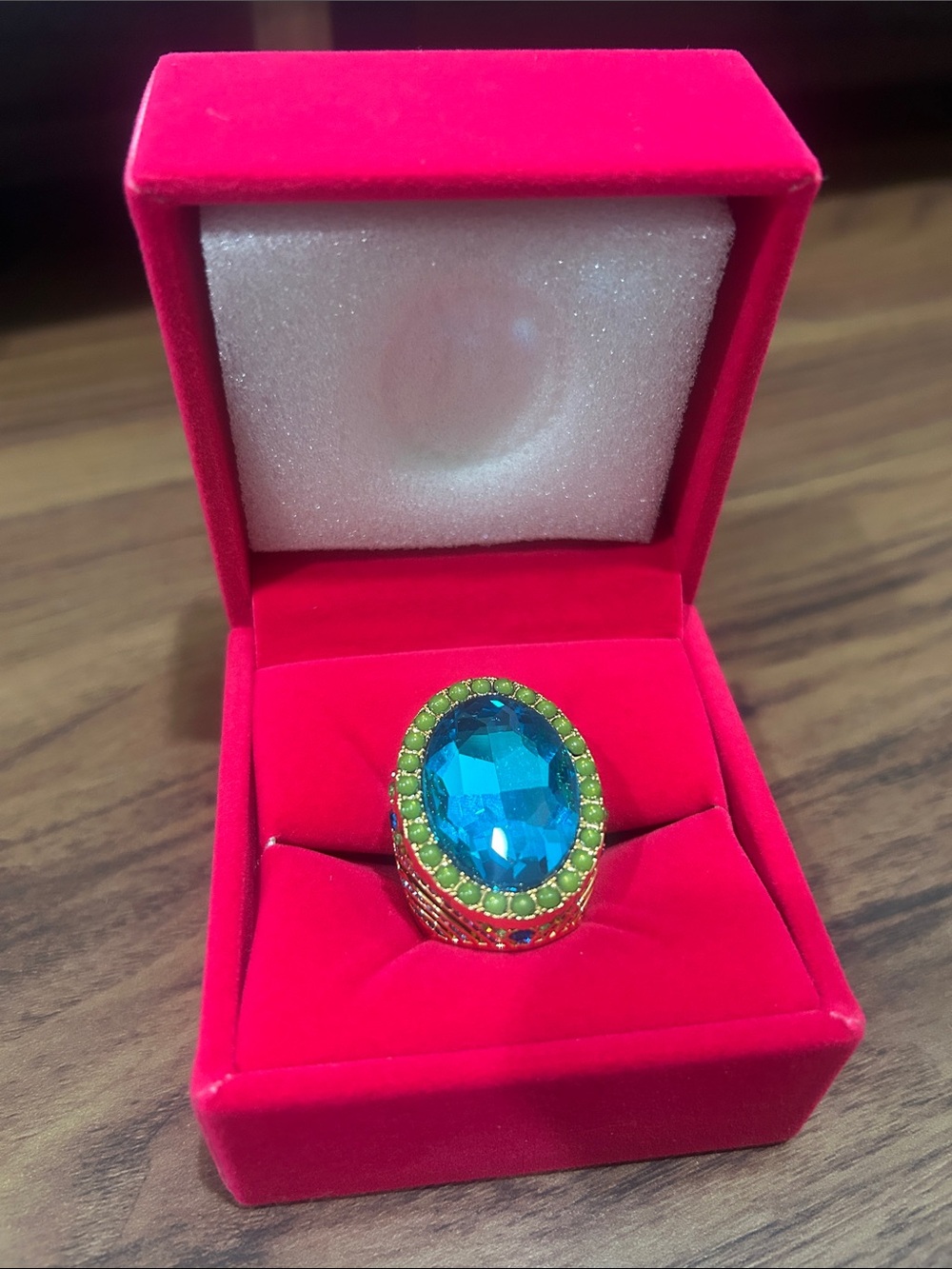 Kurt Geiger Blue Crystal Oval Cocktail Ring with Green Accent Stones
